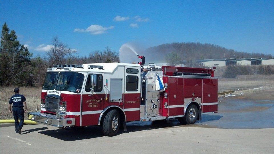 fire department engine pumping water