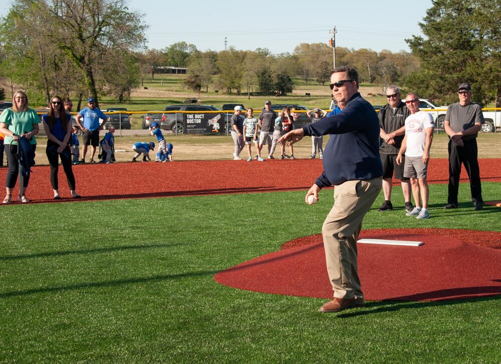 Ron Czanstkowski throwing opening pitch.