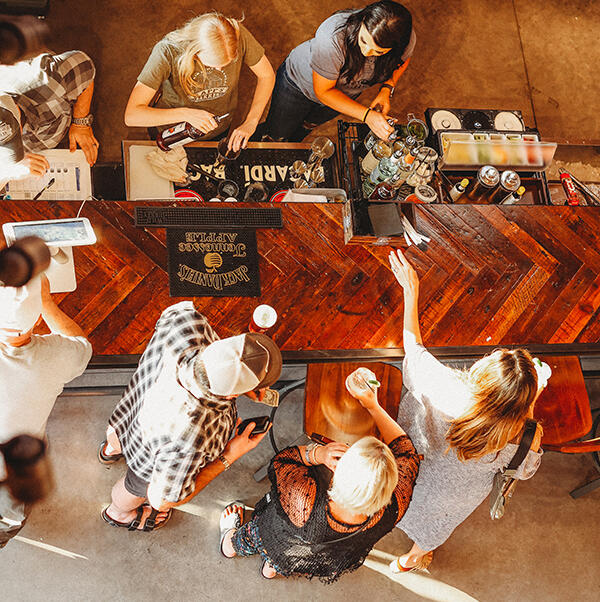 Above bar - customers being served