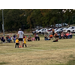 Youth soccer coach with two players.